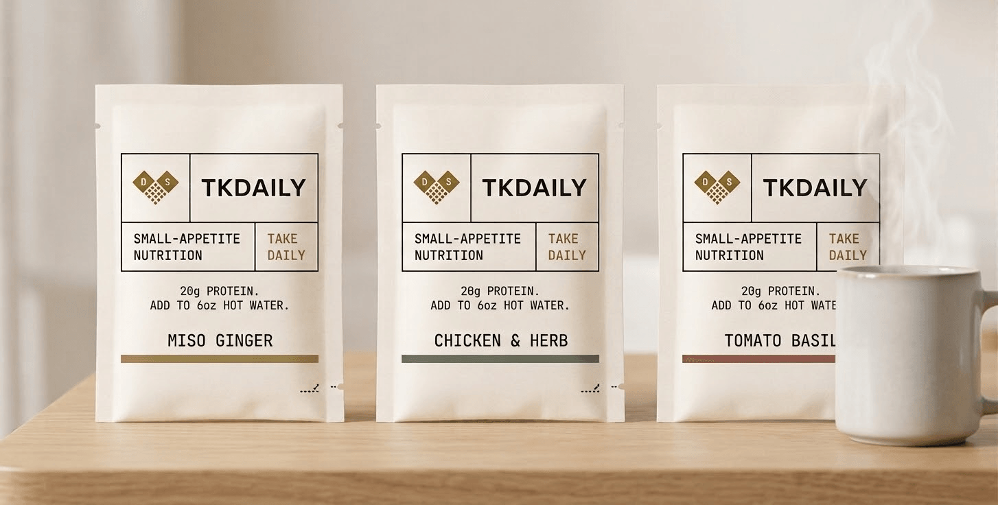 Three TKDAILY Dose sachets: Miso Ginger, Chicken & Herb, and Tomato Basil.